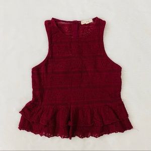 Burgundy tank top.